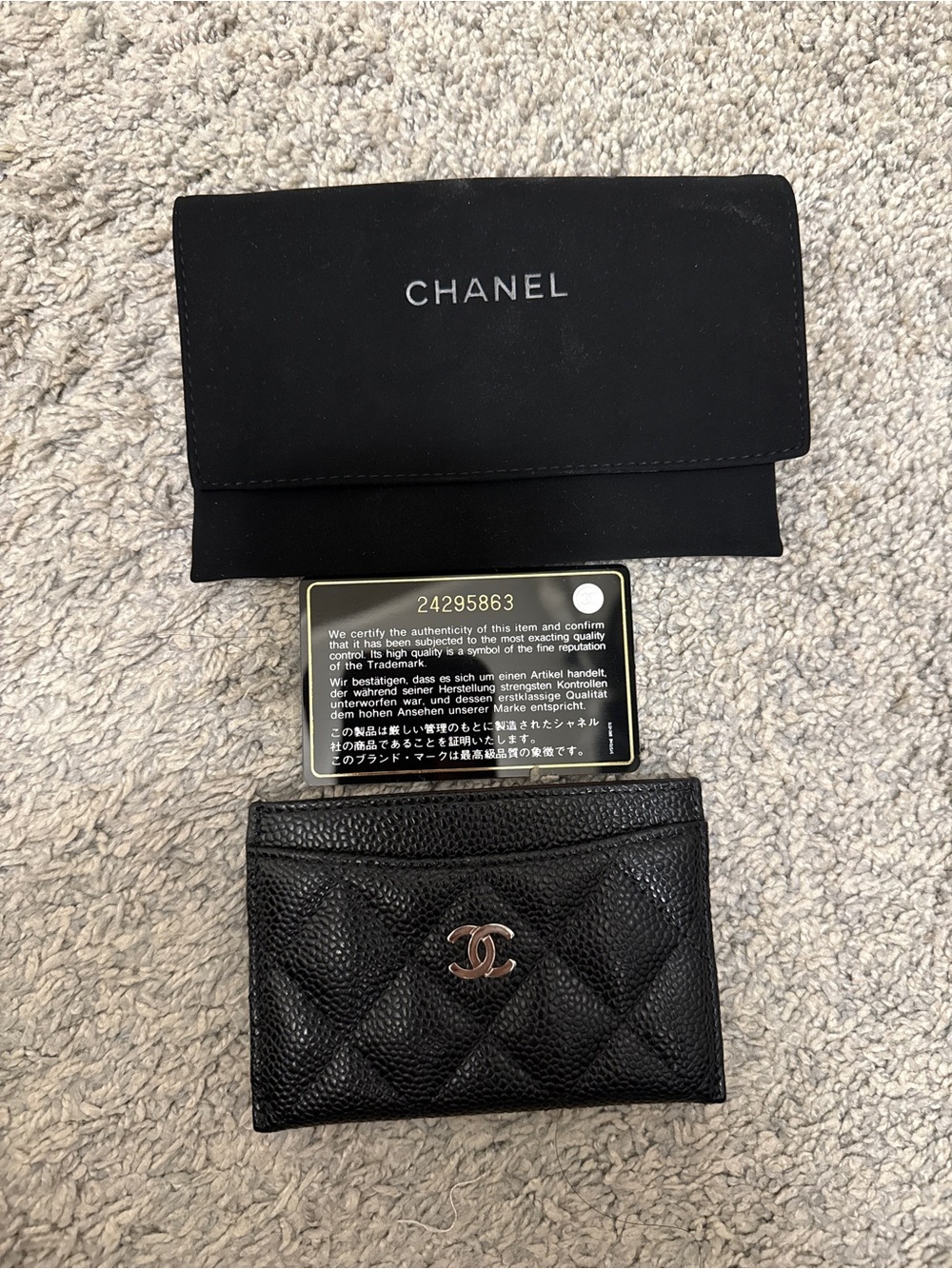 CHANEL Black Quilted caviar card holder